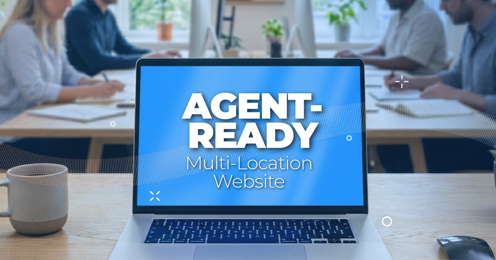 Agent-ready multi-location website concept on a laptop screen in a modern office